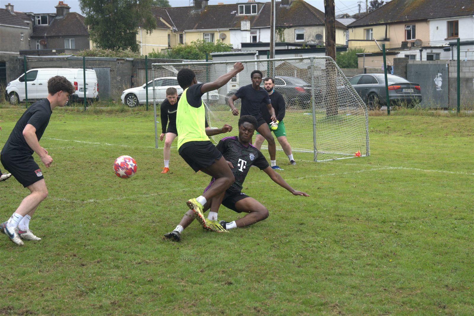 Match action from an Athlone's Finest game, players challenging for the ball in front of the goal