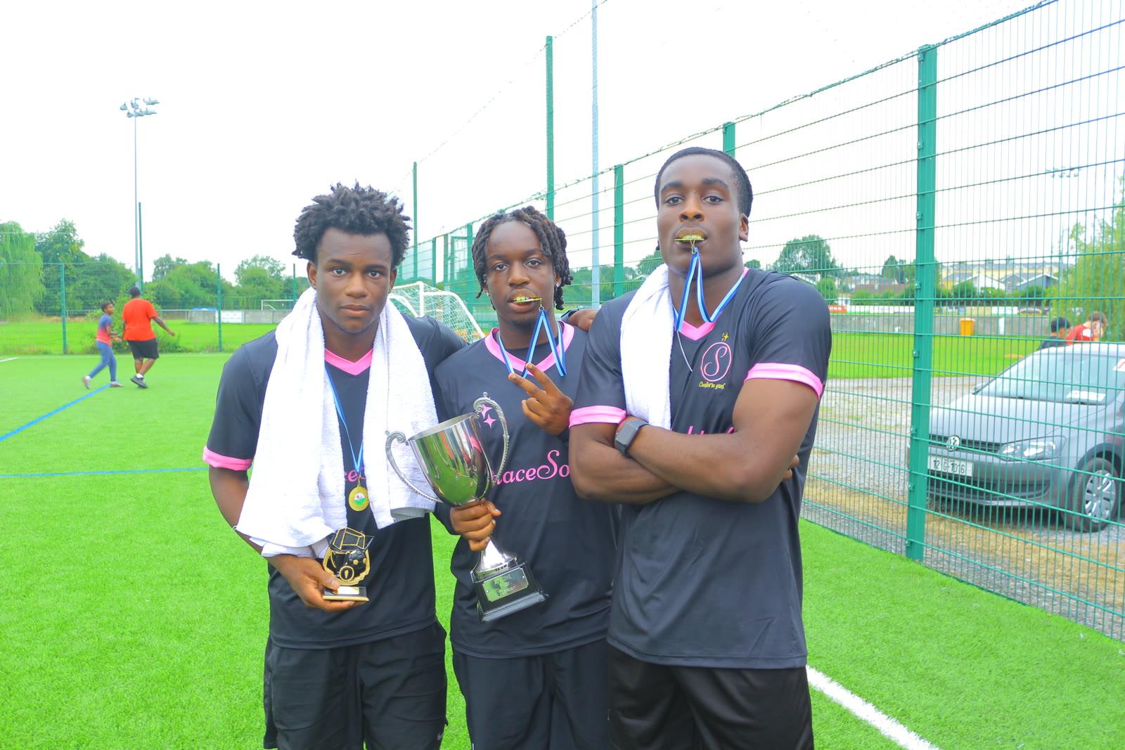 2025 tournament winners with medals and trophy