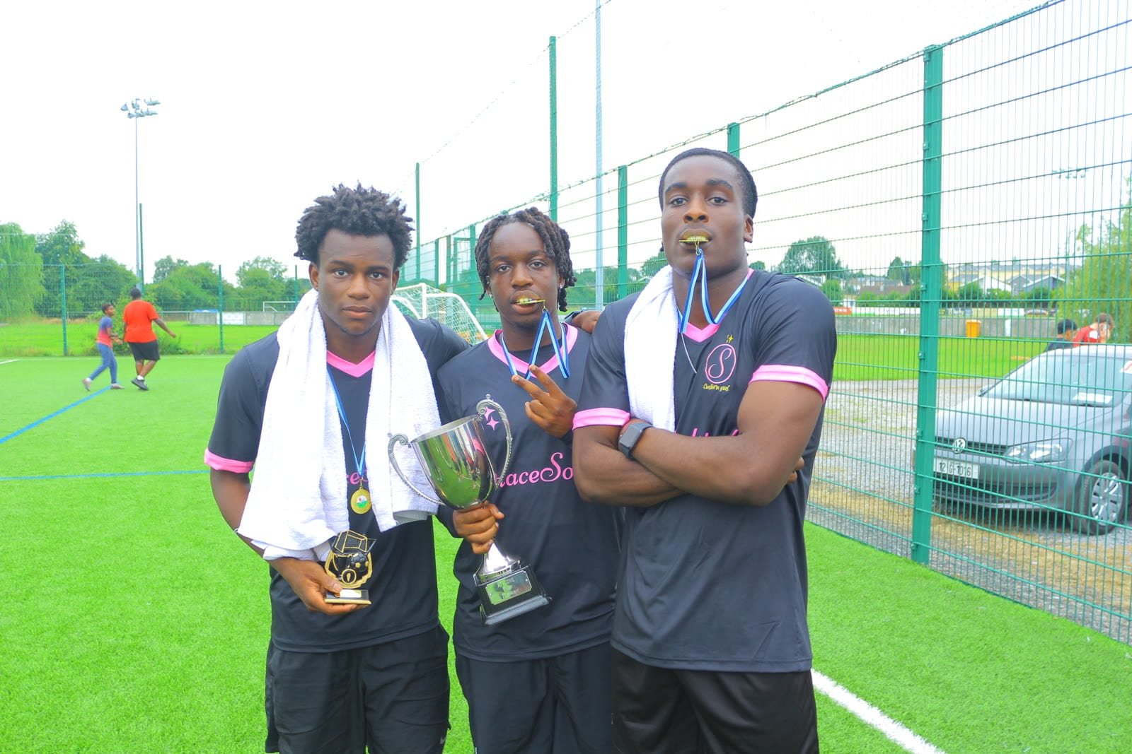 2025 tournament winners with medals and trophy